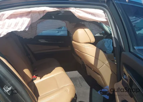 2011 BMW 750Li z USA, uszkodzony, nr VIN WBAKB8C52BCY66290